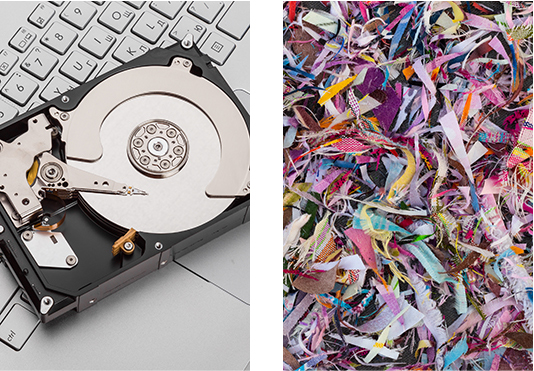 hard drive and shredded paper