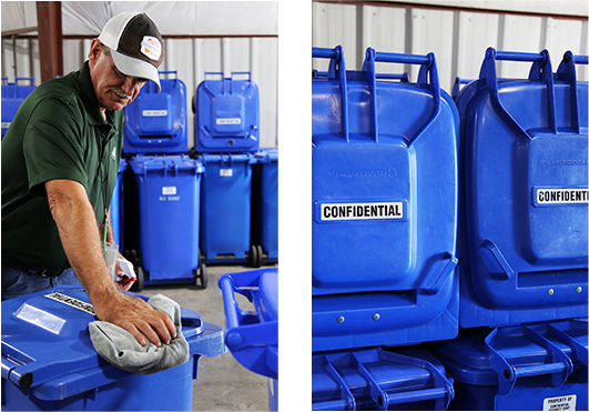 CSC team member cleaning a shredding bin